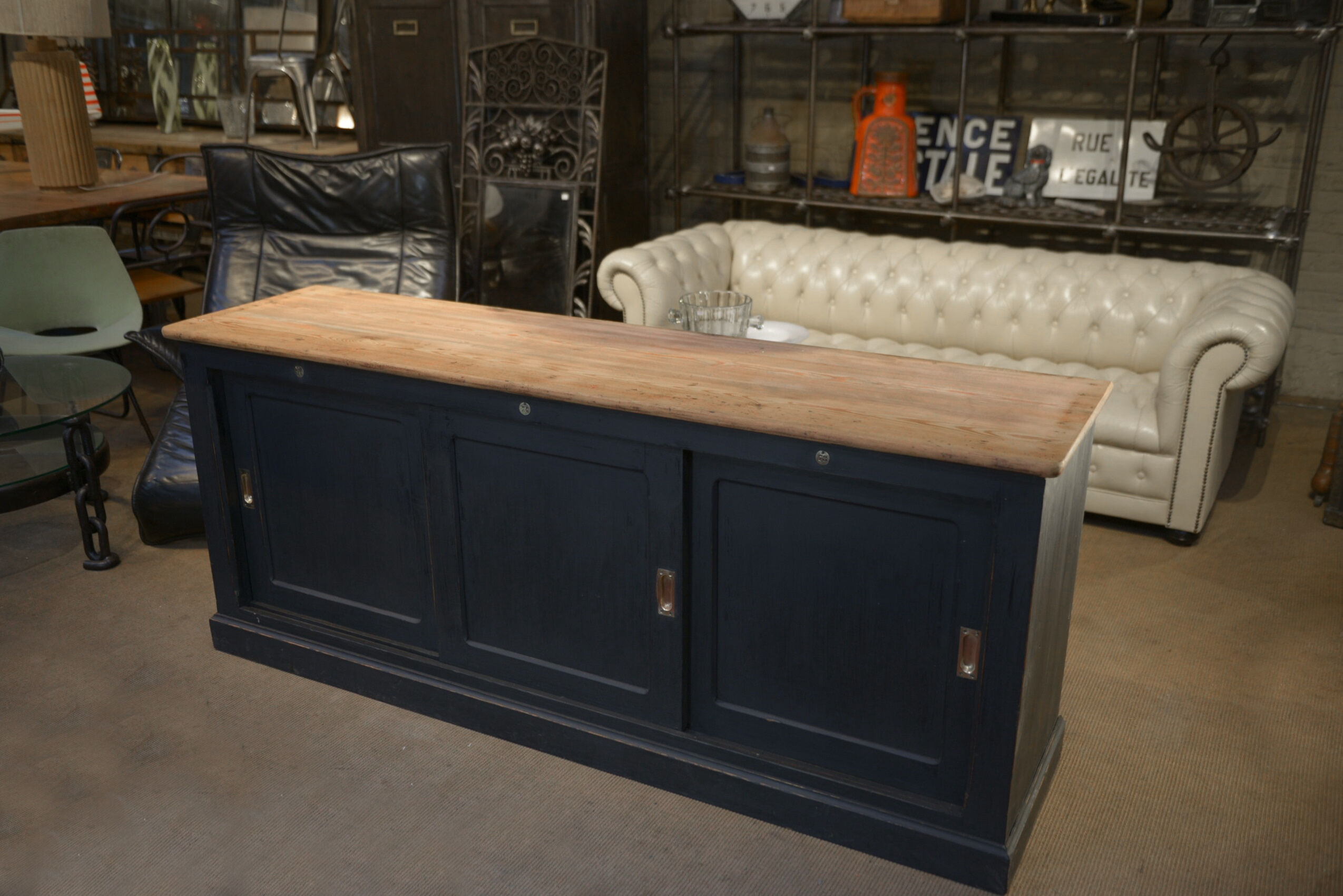 Low cabinet with sliding doors in fir 1930