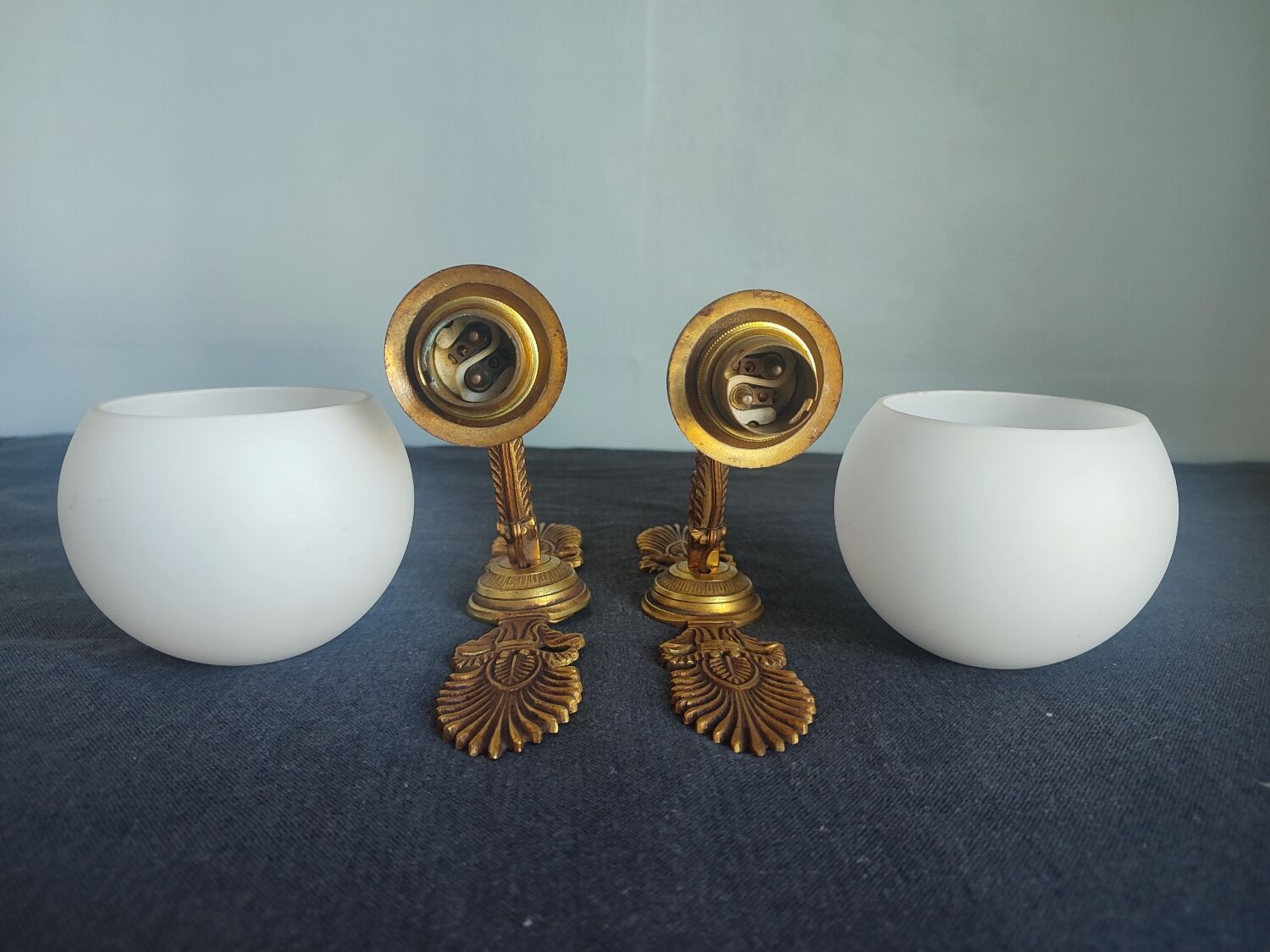 Pair of vintage brass and opaline wall lights