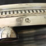 Silver-plated trivet.