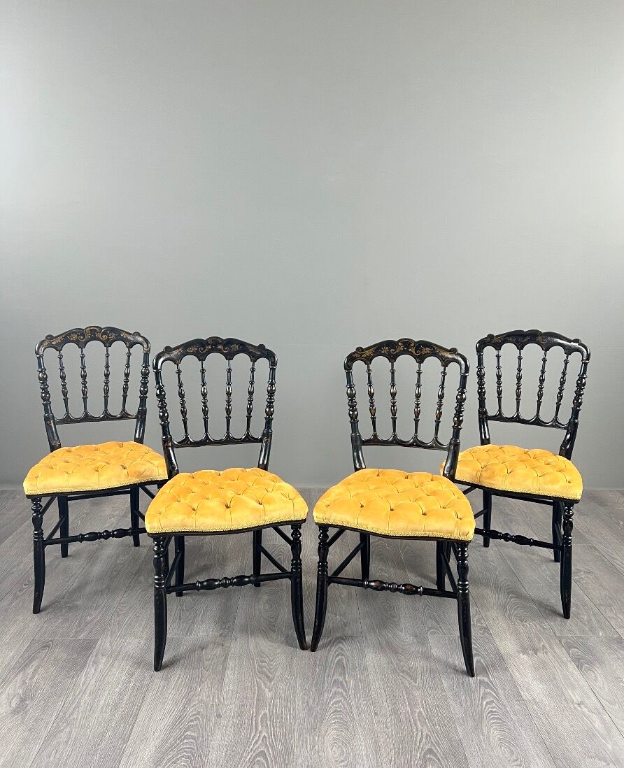 Set of four Napoleon III chairs in blackened wood, 19th century.