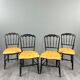 Set of four Napoleon III chairs in blackened wood, 19th century.