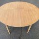 Table à manger scandinave ronde extensible rénovée en teck 1950