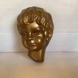 Golden cherub head