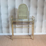 Dressing table in gold metal