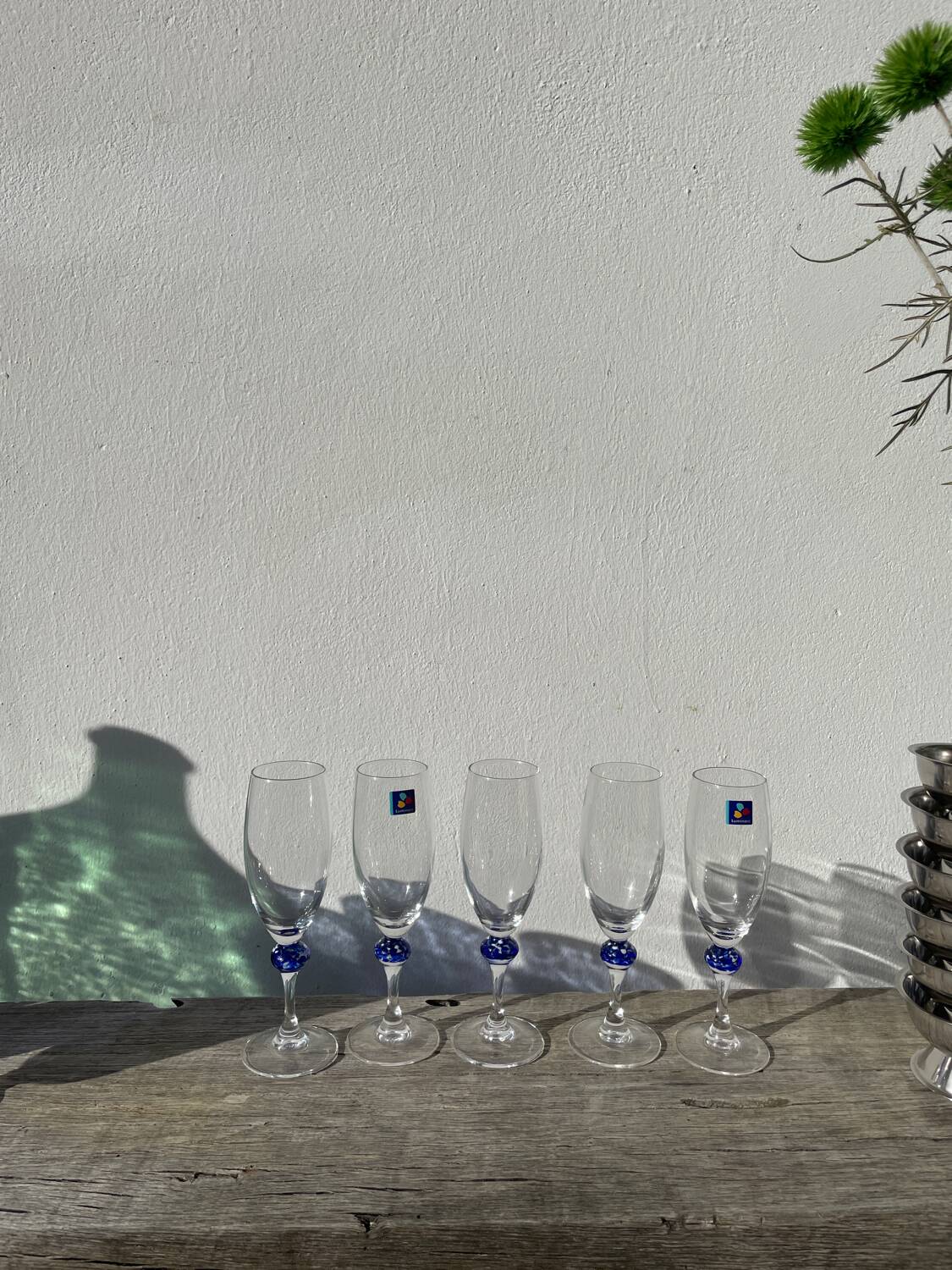 5 Luminarc blue glass flutes