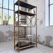 Rattan bookshelf and black glasses