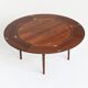 Dyrlund Lotus Flip Flap dining table in rosewood Denmark 1960