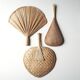 Trio of wall decorations in straw and wicker, 70s