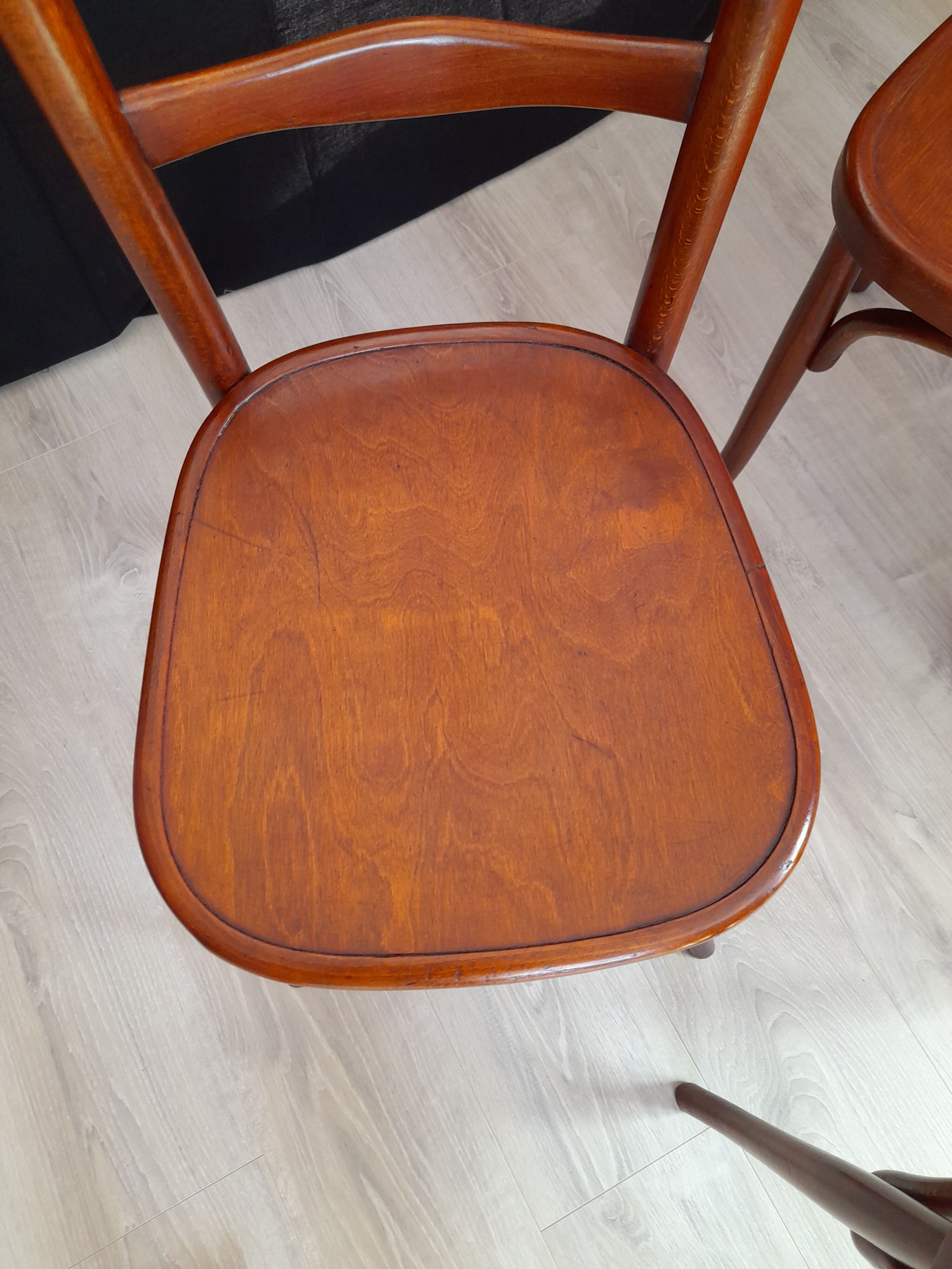 Suite of 4 bistro chairs, published by fischel