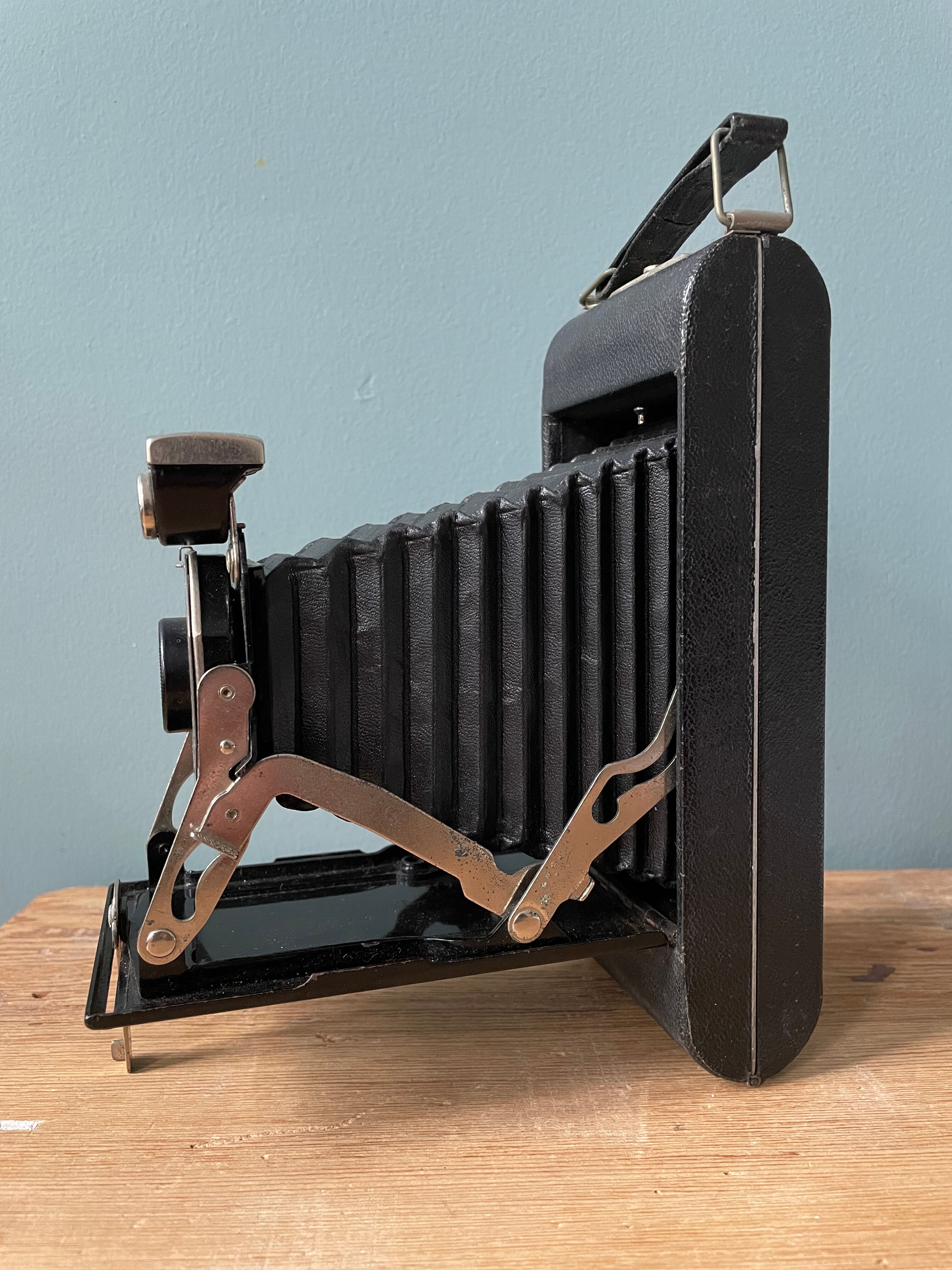 Old Kodak Brownie Six 16 folding bellows camera with leather case