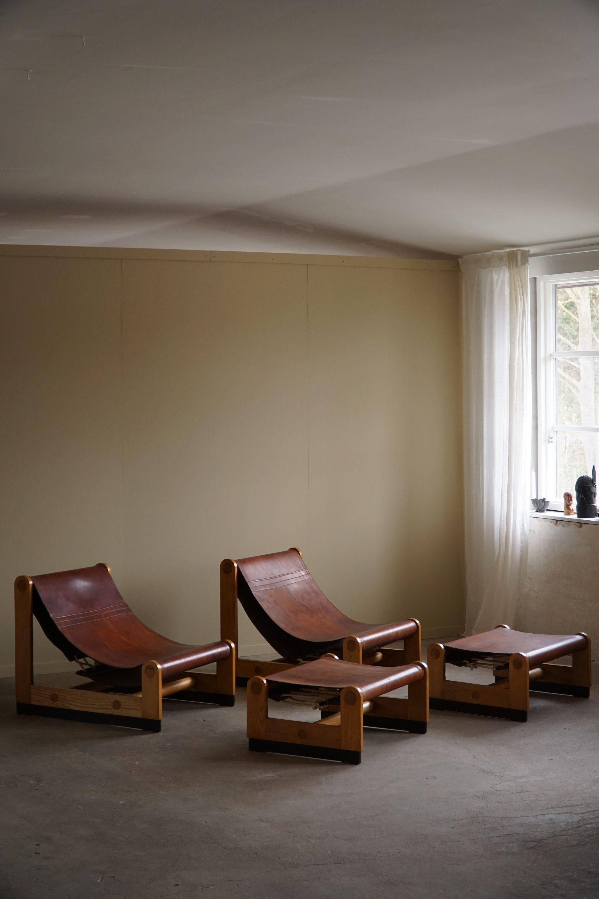 Francesco Lucianetti, Lounge chairs in leather and elm, Italian modern, 1960s