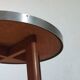 Vintage metal and teak side table from the 1950s.