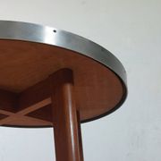 Vintage metal and teak side table from the 1950s.
