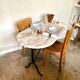 Bistro table in gray marble and cast iron
