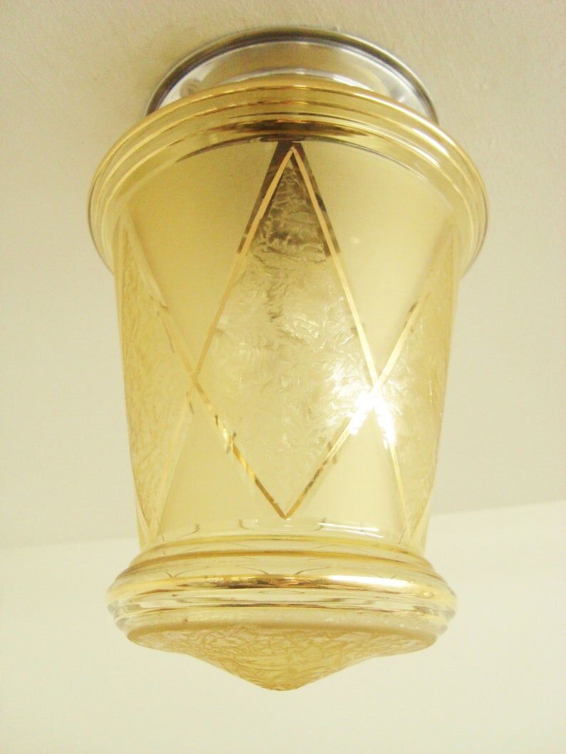 Ancient lantern of the 50s golden glass