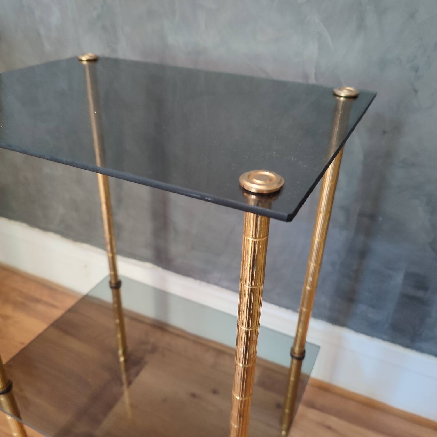 Smoked glass side table or pedestal table from the 70s