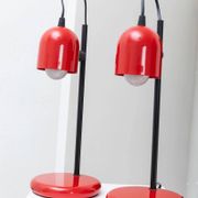 Set of 2 red metal table lamps with black stems, Memphis-Postmodern Italy 1980s