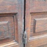 Porte d’entrée vitrée en chêne et grilles en fer, XIXème s.