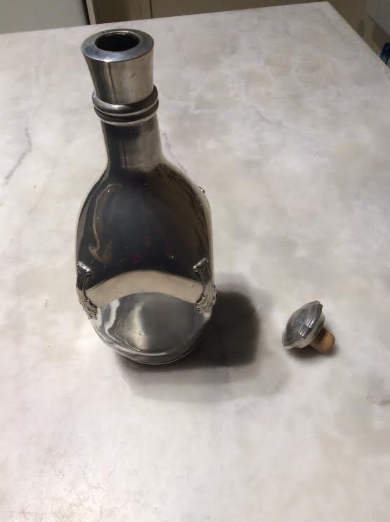 Glass and tin carafe