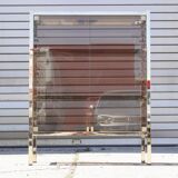 Post-modern low window in brass and smoked glass, 1970s