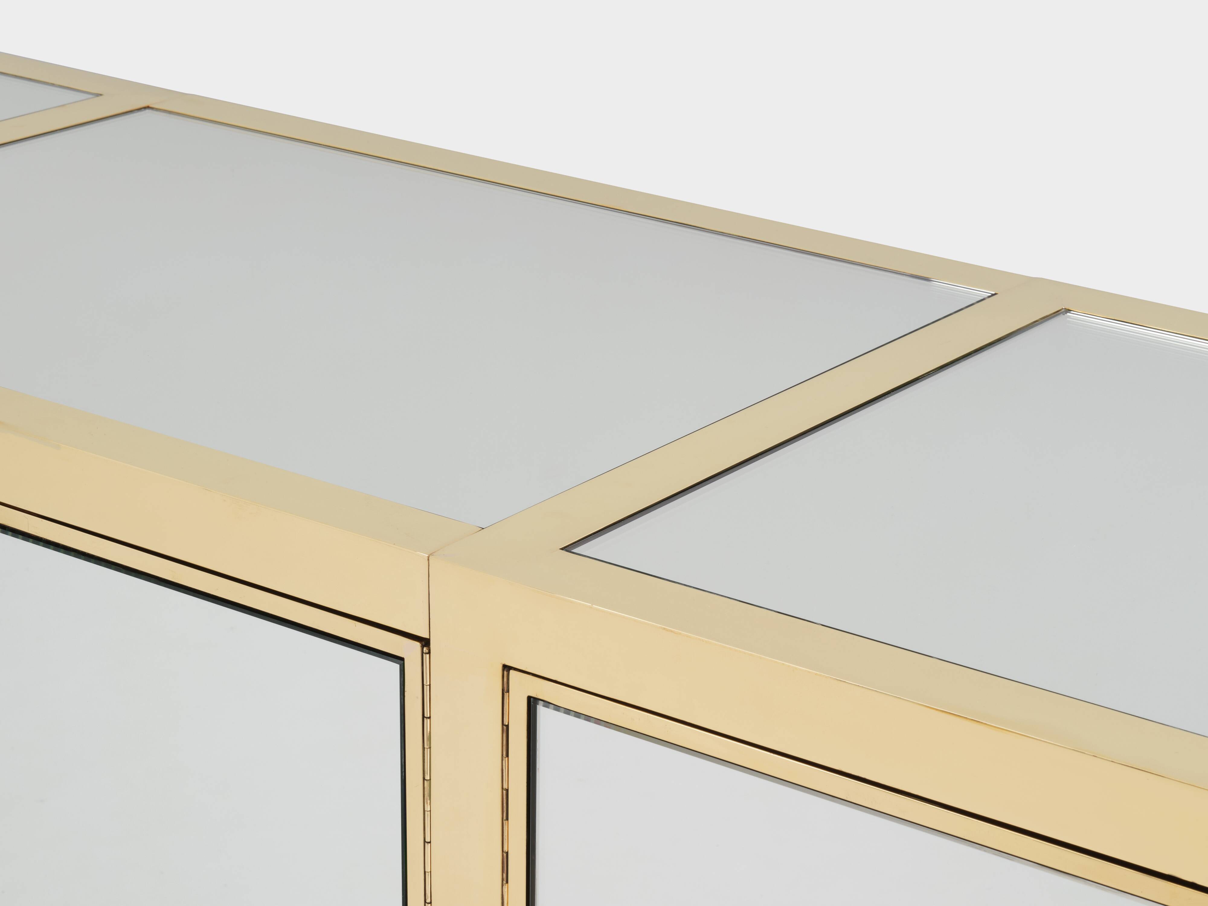 Brass sideboard with mirror and plexiglass legs by Michel Pigneres, 1970