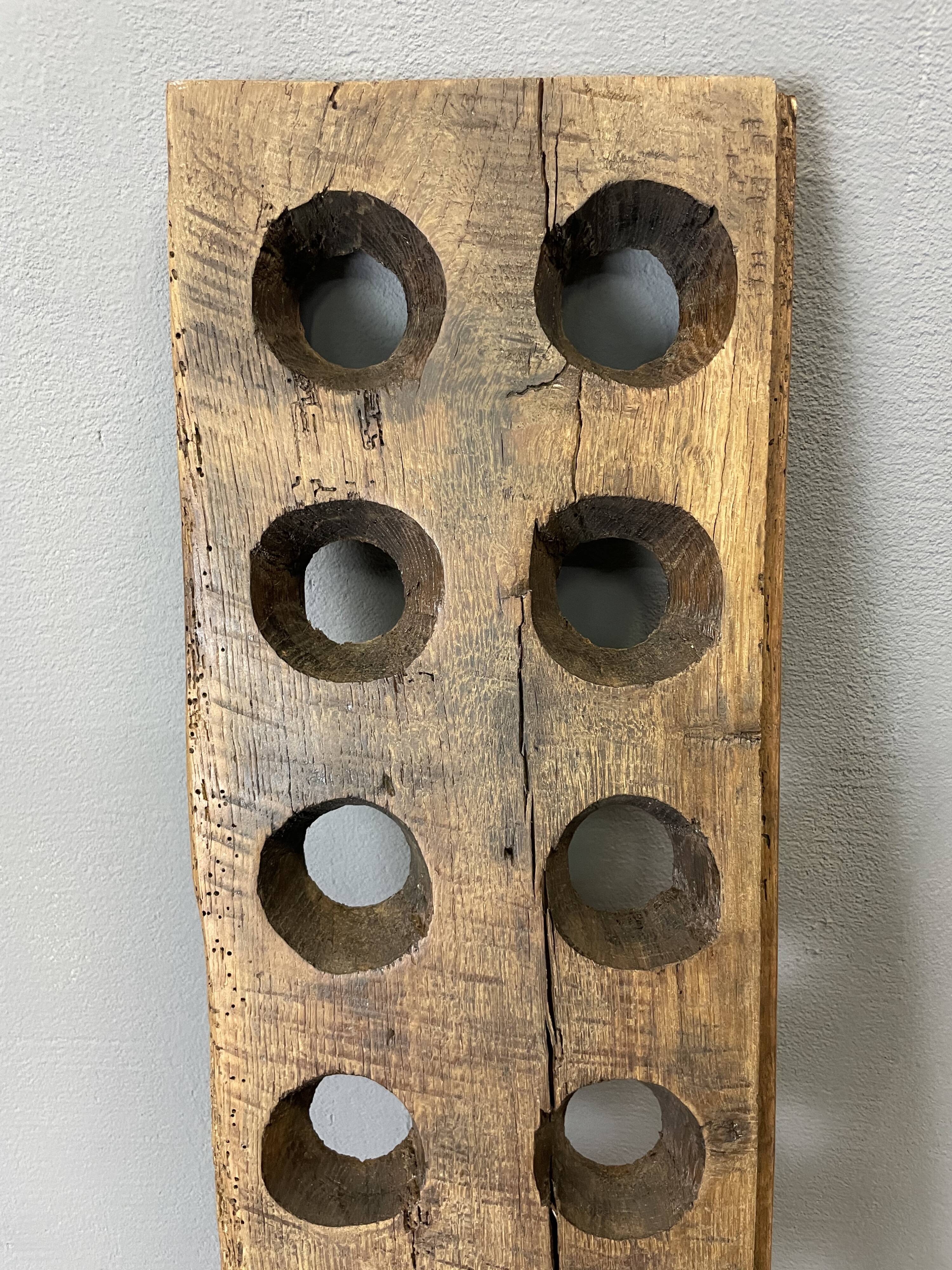 Brutalist oak bottle rack, late nineteenth century