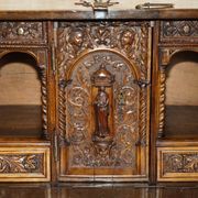 18th-century carved Spanish cabinet with hidden storage.