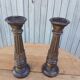 2 carved wooden candlesticks