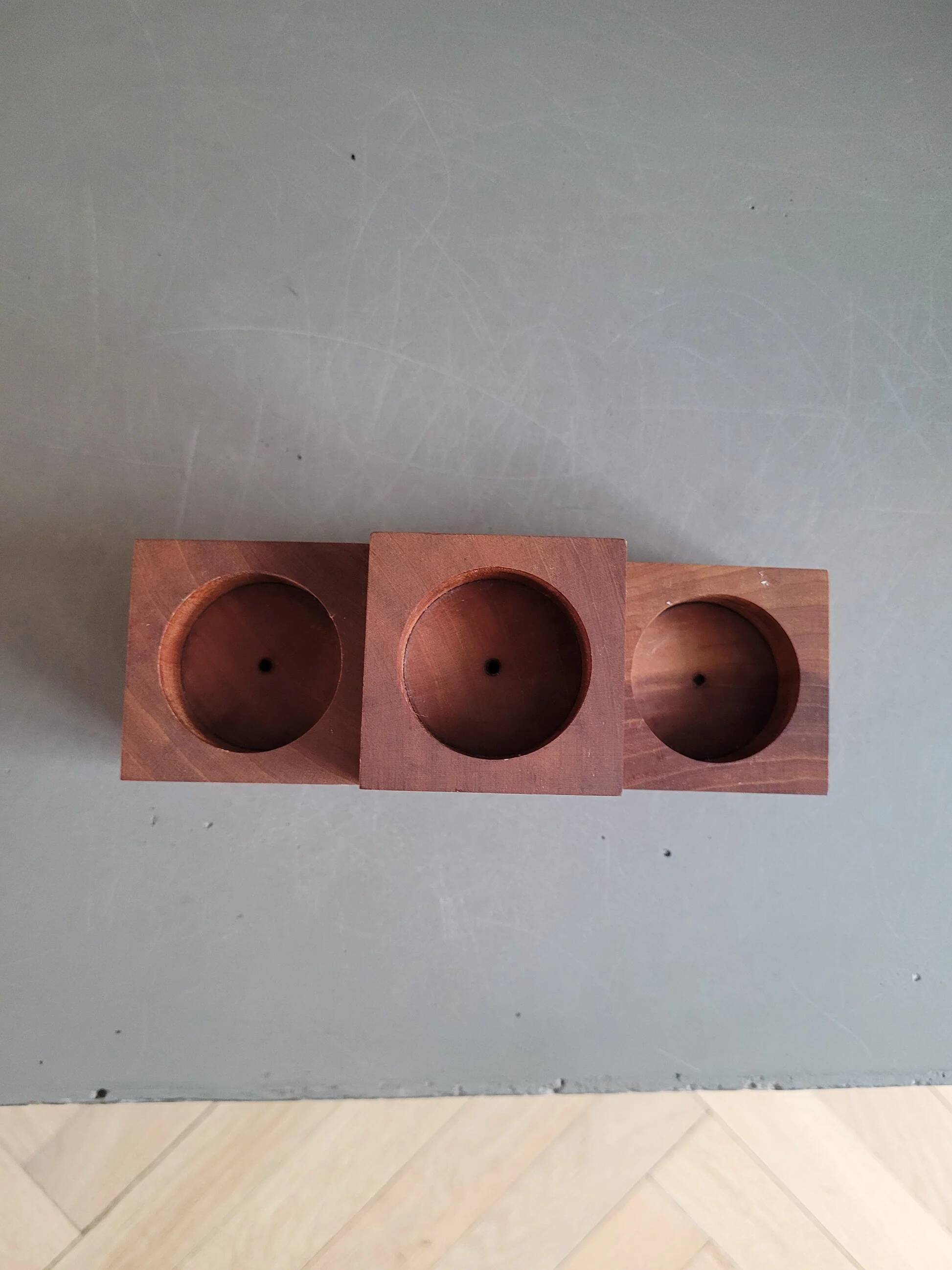 Vintage teak candlestick trio