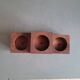 Vintage teak candlestick trio