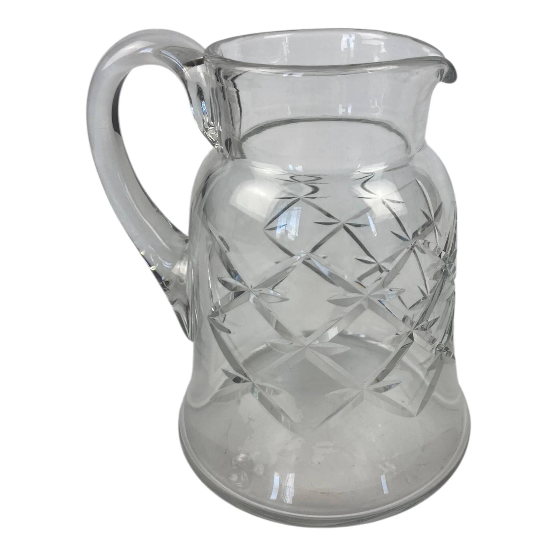 Antique Baccarat water jug in cut crystal with bevels.