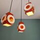 Space Age cascade chandelier in orange and white lacquered metal, RAAK, 1970