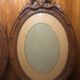 Old carved wooden medallion frame