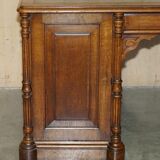 Antique double-sided desk C Hindley & Son in oak and leather