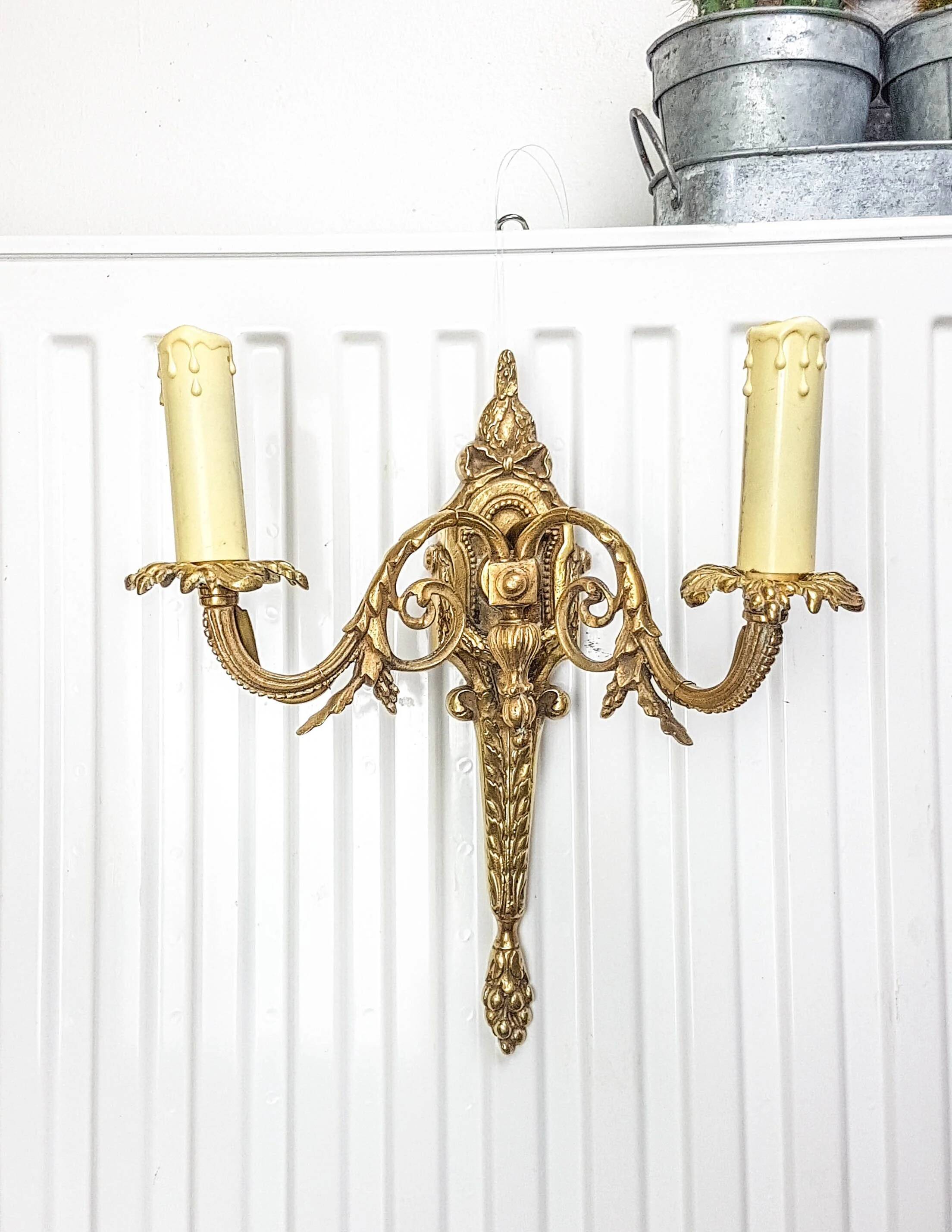 Bronze wall sconce in Empire style