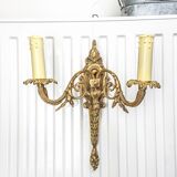 Bronze wall sconce in Empire style