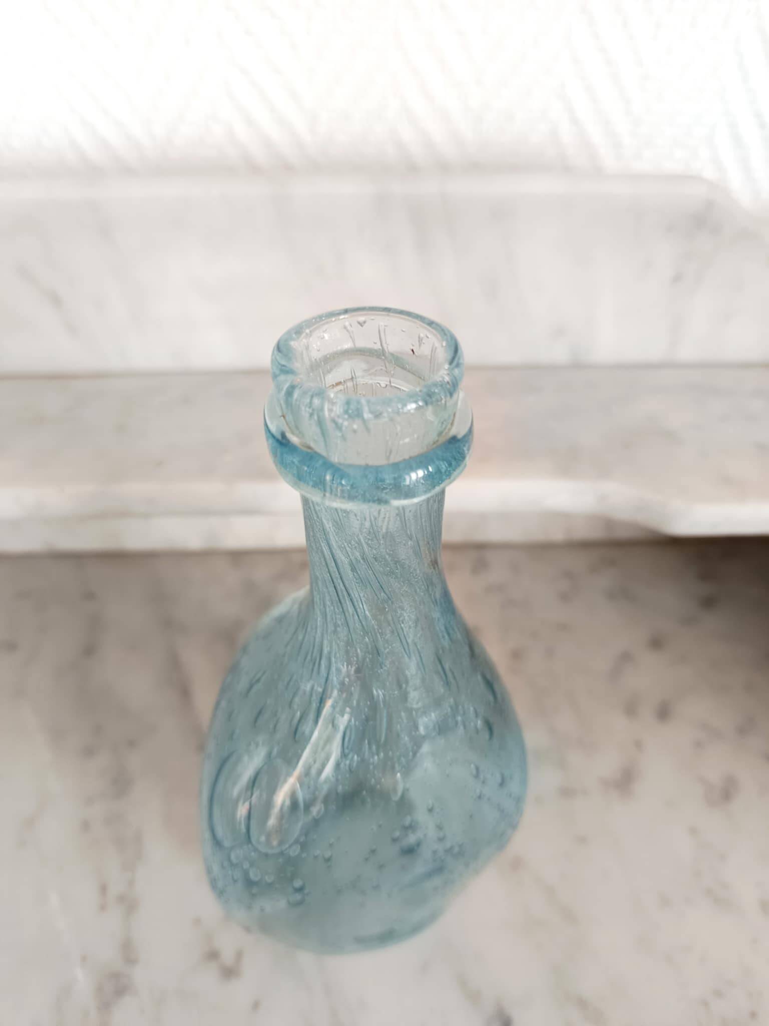 Two bubble glass carafes