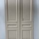 Pair of Haussmann-style double passage doors in patinated oak from the 19th century.
