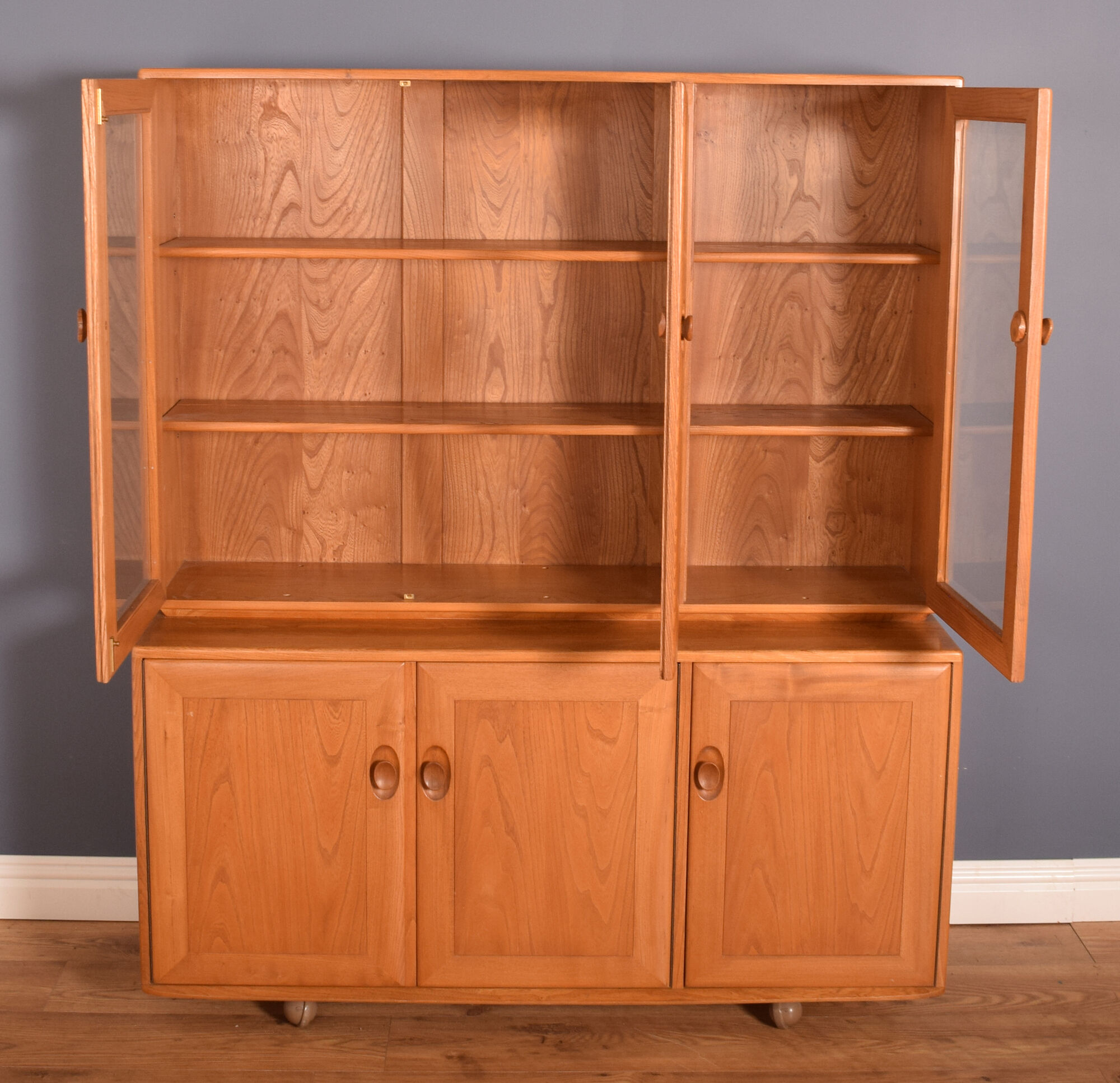 Ercol elm windsor model 806,803 glazed three door cabinet dresser