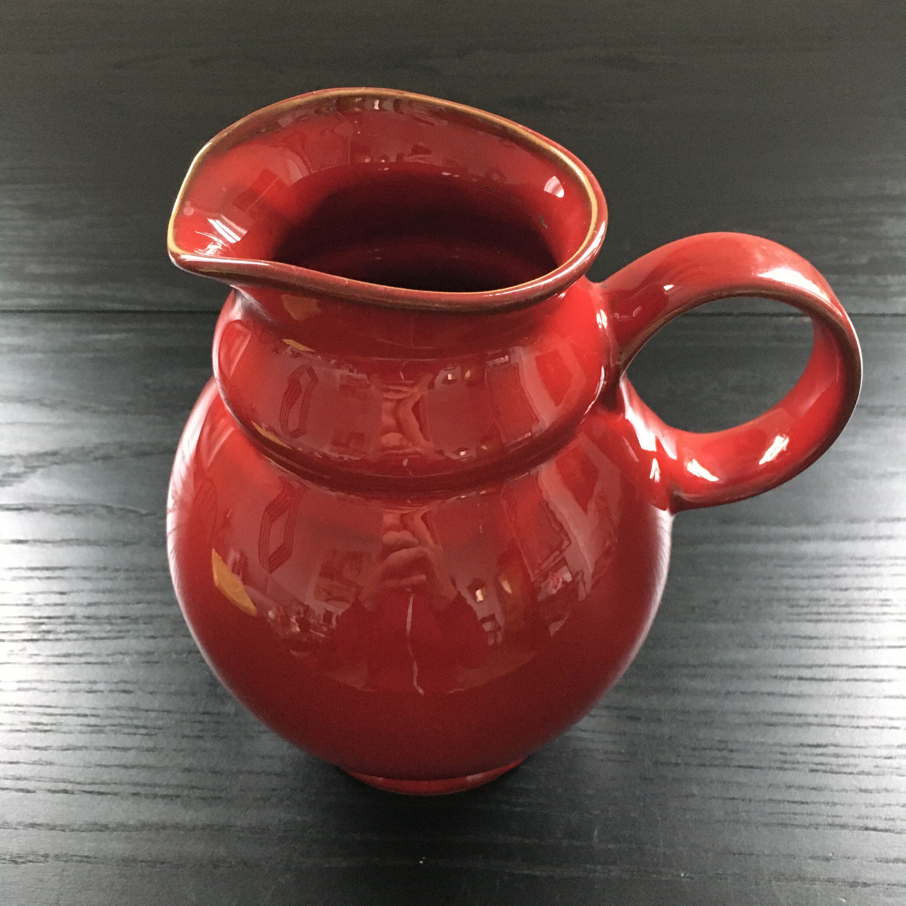 Dark red pitcher