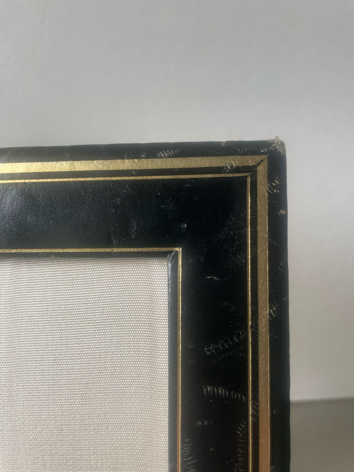 Antique black leather  with gilding frame measurements 19 cm x 15 cm