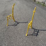 Pair of cast iron garden bench posts circa 1930