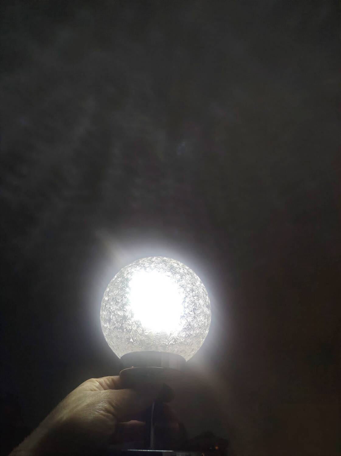 Duo of lamps in textured globe with a great play of light.