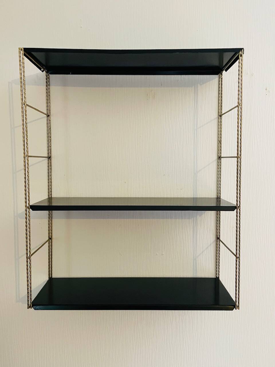 Vintage adjustable “string” shelf in metal and brass, Circa 60's