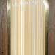 Pair of Art Deco wall sconces in brass and glass by Genet-Michon.