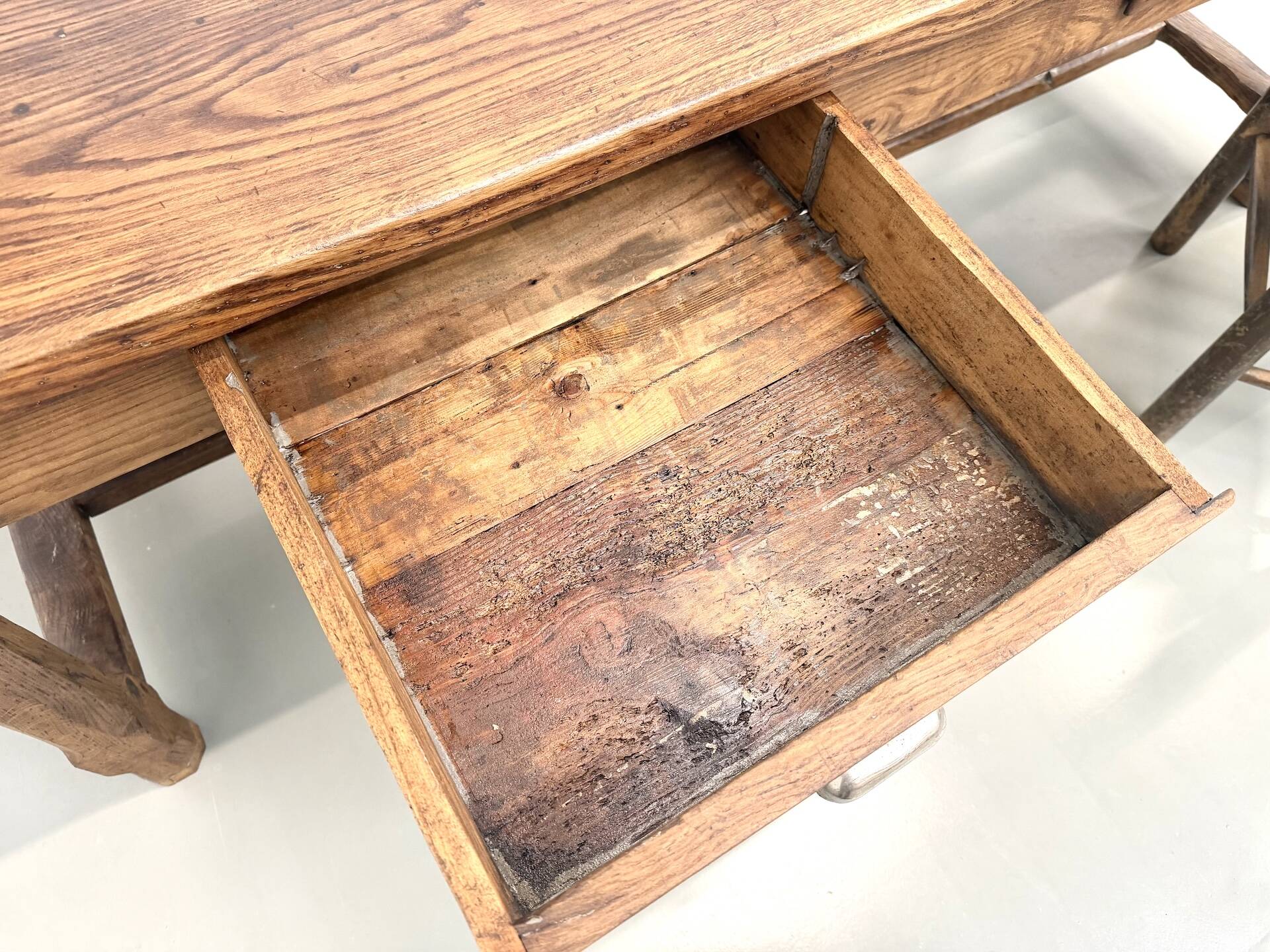 Authentic French farmhouse table from 1890 in solid oak with two drawers.