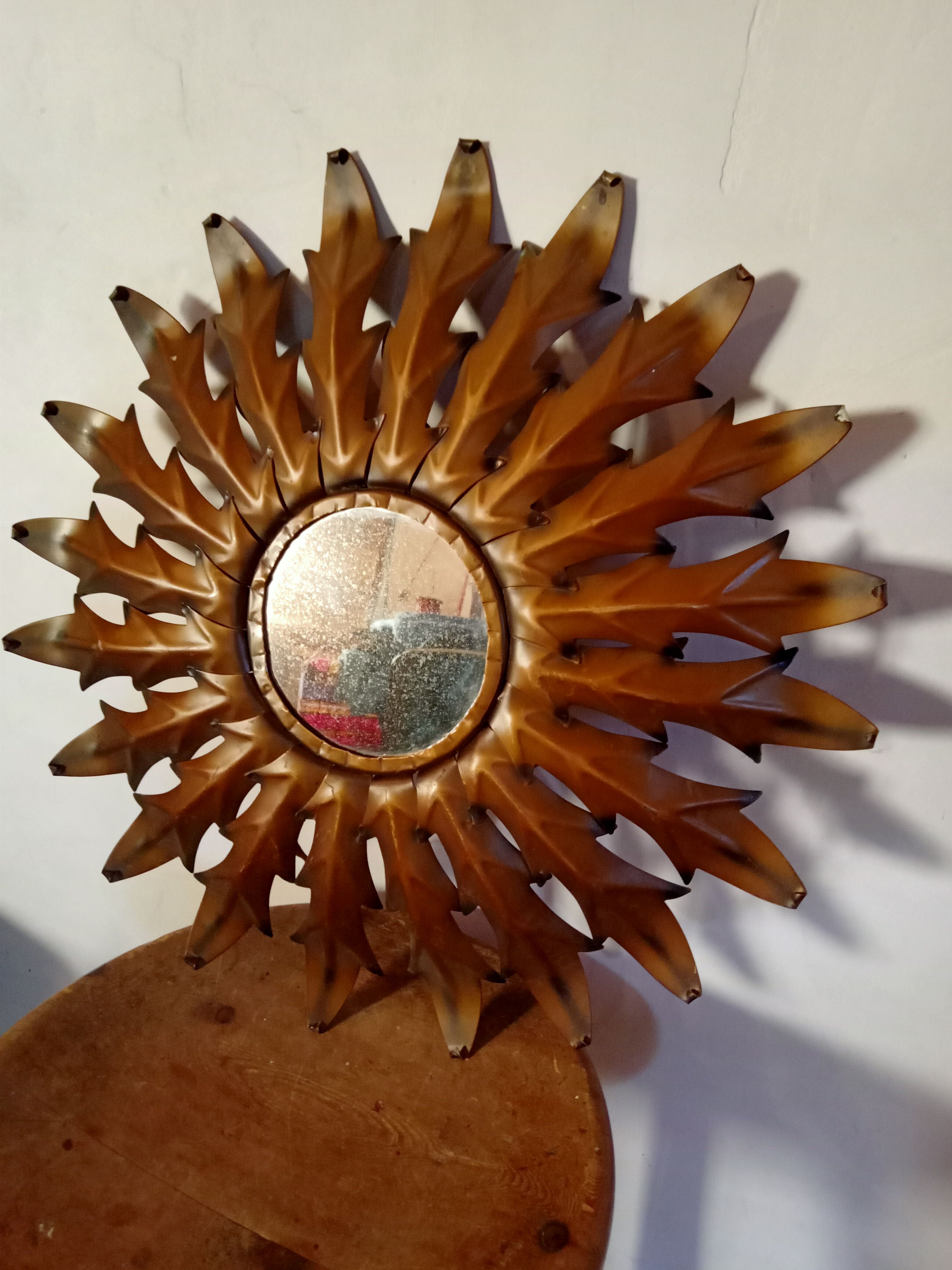 Vintage metal sun mirror