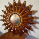 Vintage metal sun mirror