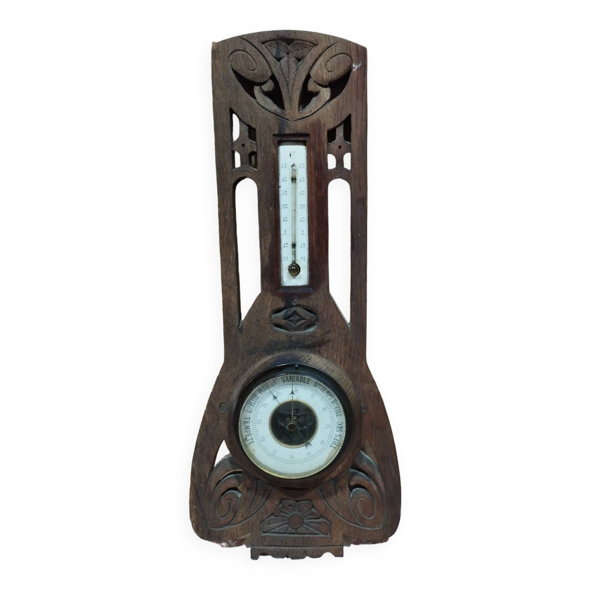 Old barometer and thermometer from the 1930s in carved wood. Signed on the back EH PARIS.
