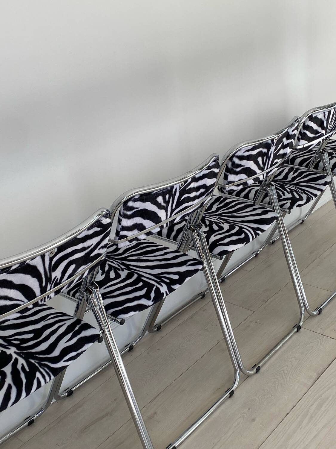 6 folding chairs in metal and zebra-patterned fabric, 1970s